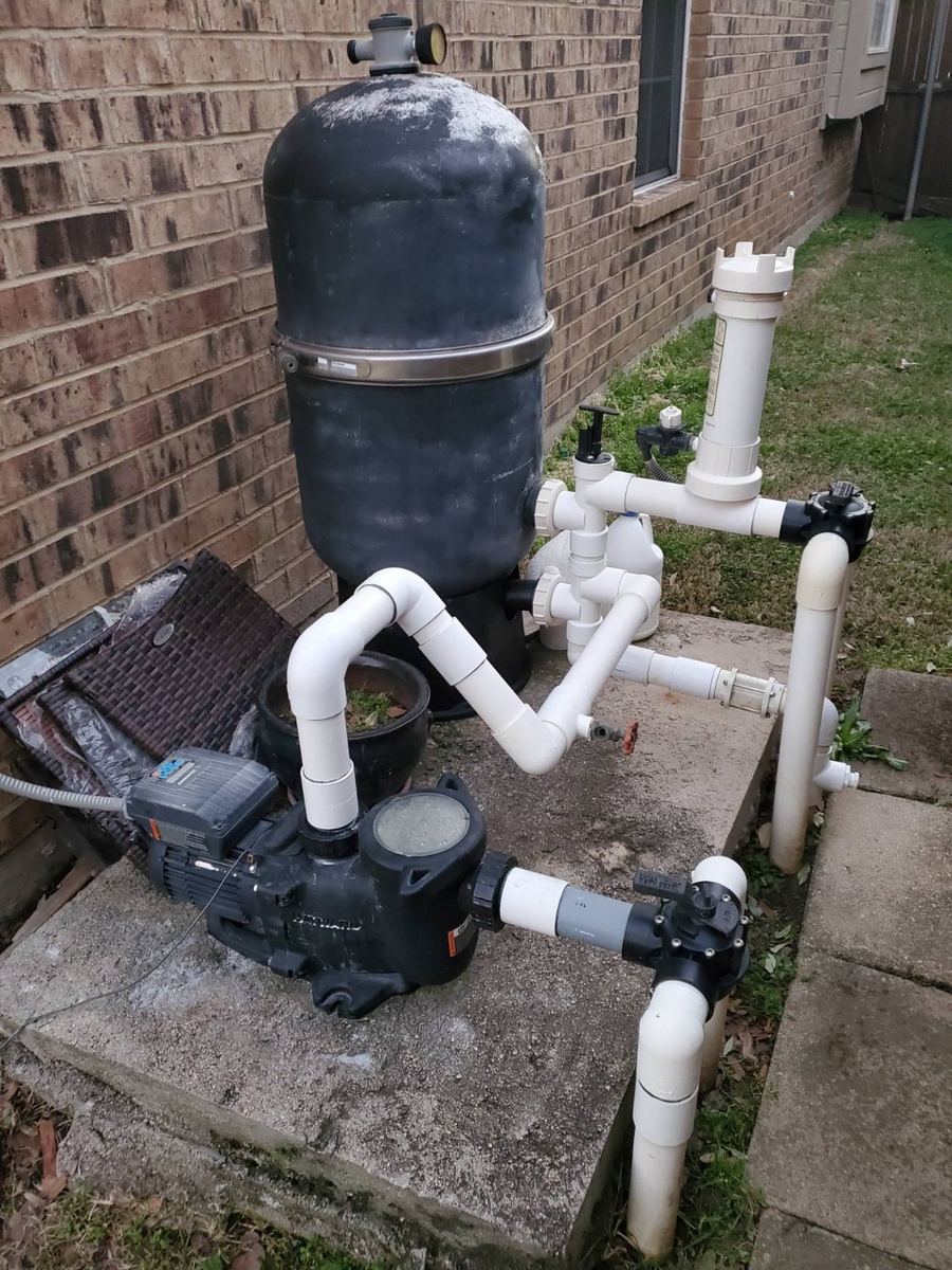 Old pool filter before replacement